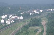 巨光乡狠抓铁路沿线农房风貌塑造工作